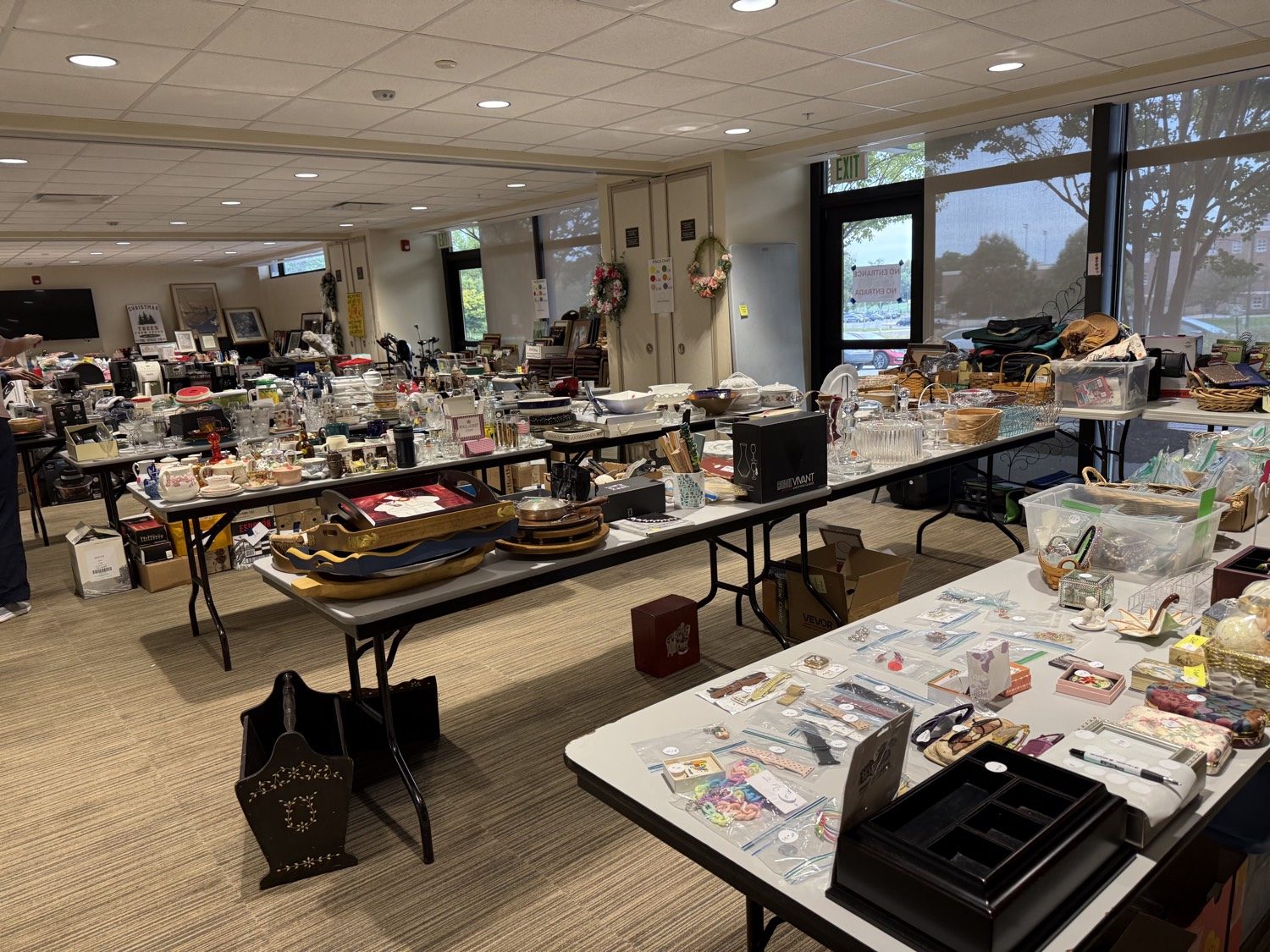 Tables of dishes, trays, and small treasures